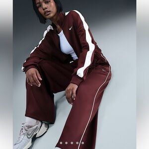 NWT Nike Sportswear Women's Mid-Rise Wide-Leg Track Pants.